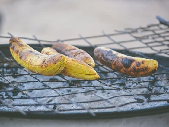 Plantain roasting on a grill