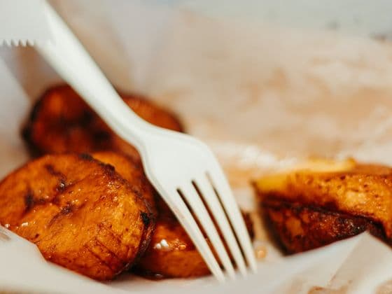 Fried plantain with a fork
