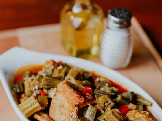 A dish of okra soup with fish